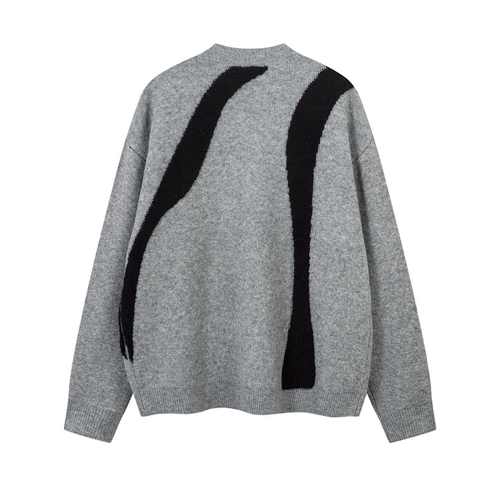 Back view of the gray knit sweater with two long black abstract curved stripes