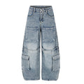 Front view of washed light blue wide-leg cargo jeans with large thigh and lower-leg pockets