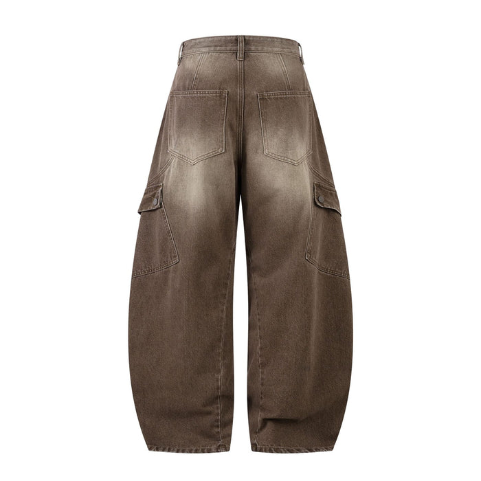Back view of brown washed wide-leg cargo jeans with two patch pockets and buttoned cargo pockets