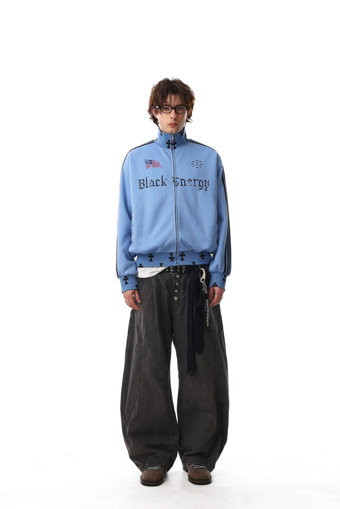 Model wearing a light blue mock neck track jacket with black stripes and front Black Energy graphic