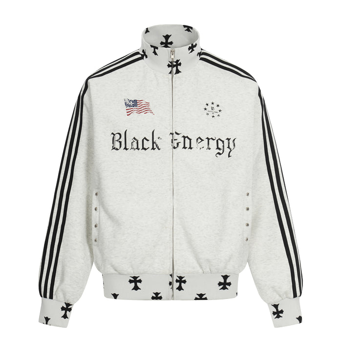Front view of a light gray mock neck full-zip jacket with black stripes, flag graphic, and cross motifs