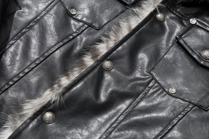 Close-up of black faux leather front panels, snap buttons, flap pockets, and fur-trimmed center opening
