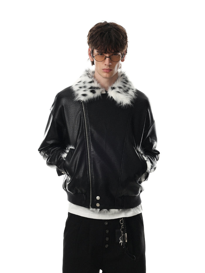 Model wearing a black faux leather bomber jacket with a spotted faux fur collar, front view