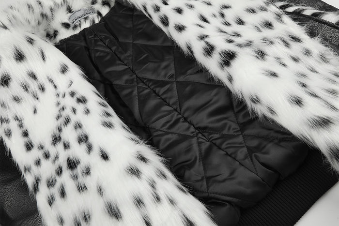 Close-up of the jacket interior showing black quilted lining beneath the spotted faux fur collar