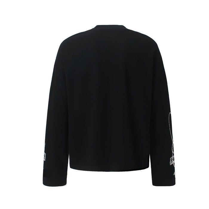Back view of a black long-sleeve tee with a plain back and partial white sleeve graphics