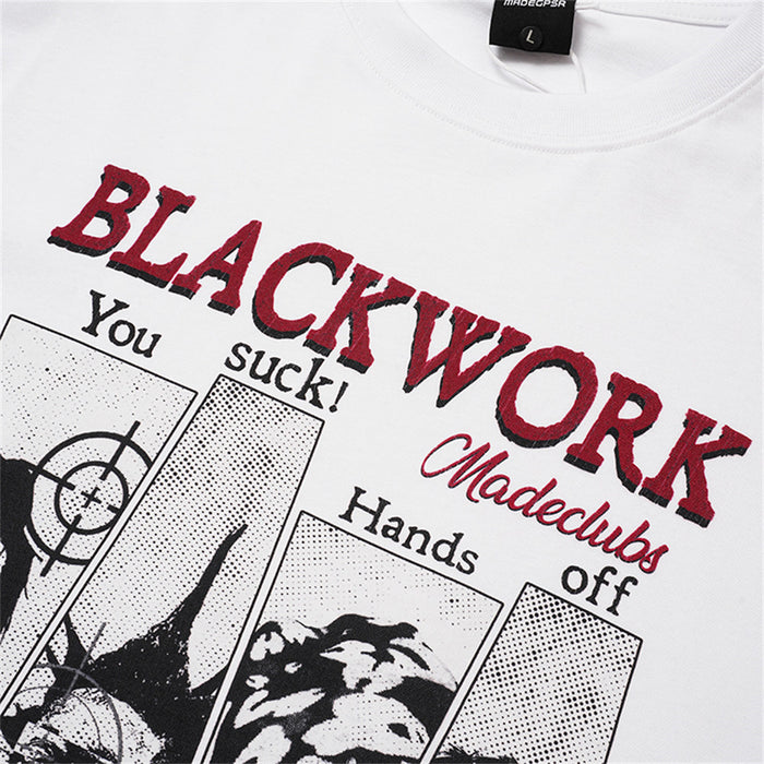 Detailed view of red and black BLACKWORK lettering with illustrated panels on white fabric