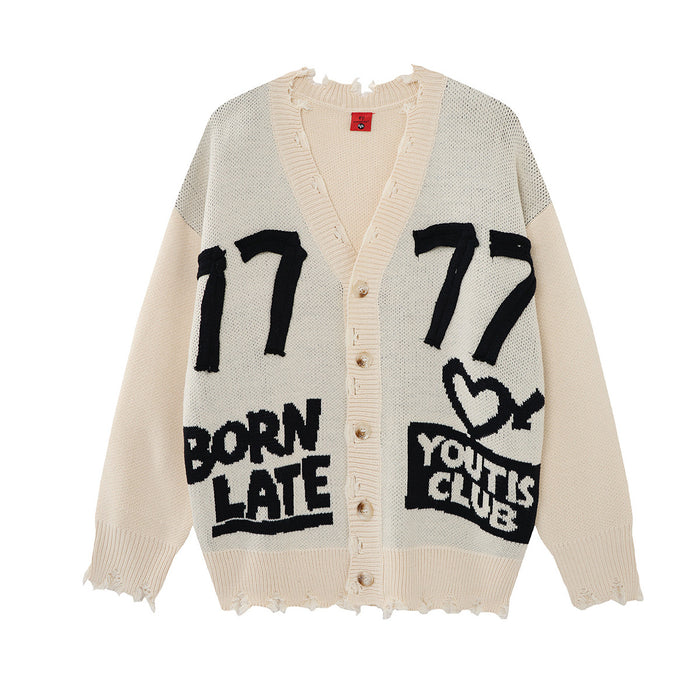 Oversized Born Late 77 distressed jacquard knit cardigan in cream with black graphic lettering and raw-edge fraying