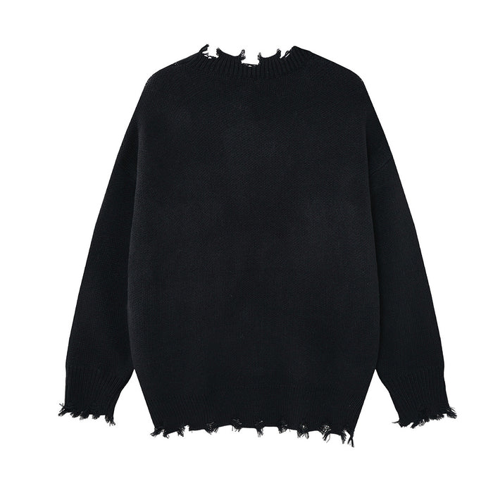 Back view of the black distressed knit cardigan showing its plain knitted body and frayed edges