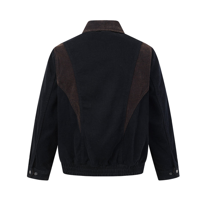 Back view of the black velvet Harrington jacket with brown contrast shoulder panels and elastic hem