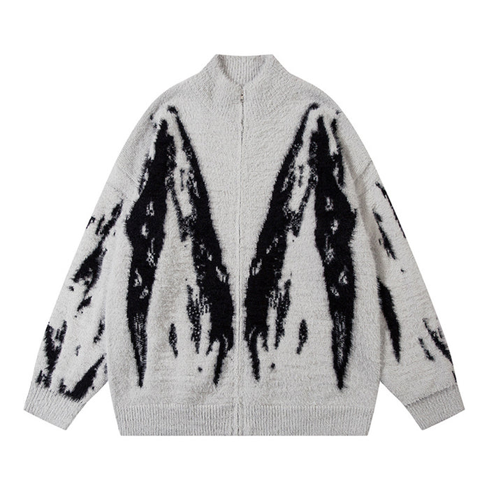 Light gray fuzzy knit cardigan shown from the front with a stand collar, zip closure, and black abstract pattern