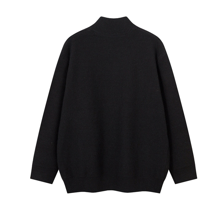 Black knit zip-up sweater jacket shown from the back with a plain knit surface and ribbed trim
