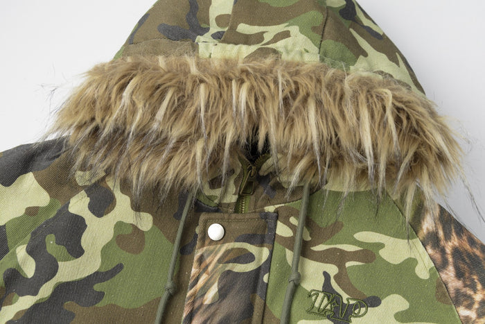 Close-up of the tan faux-fur hood trim and snap-button front closure on the camouflage bomber jacket