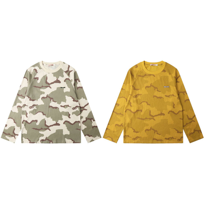 Two long-sleeve waffle-knit crew neck shirts in cream camo and mustard brown camo, shown from the front