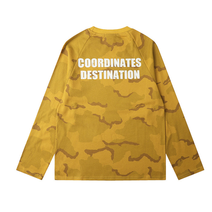 Back view of a mustard yellow camouflage waffle-knit shirt with large white Coordinates Destination lettering