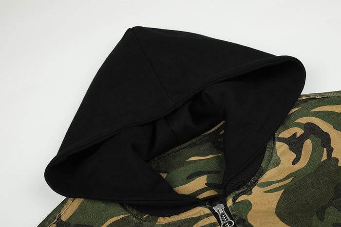 Close-up of the bomber jacket's black hood showing its structured edge and camouflage fabric beneath
