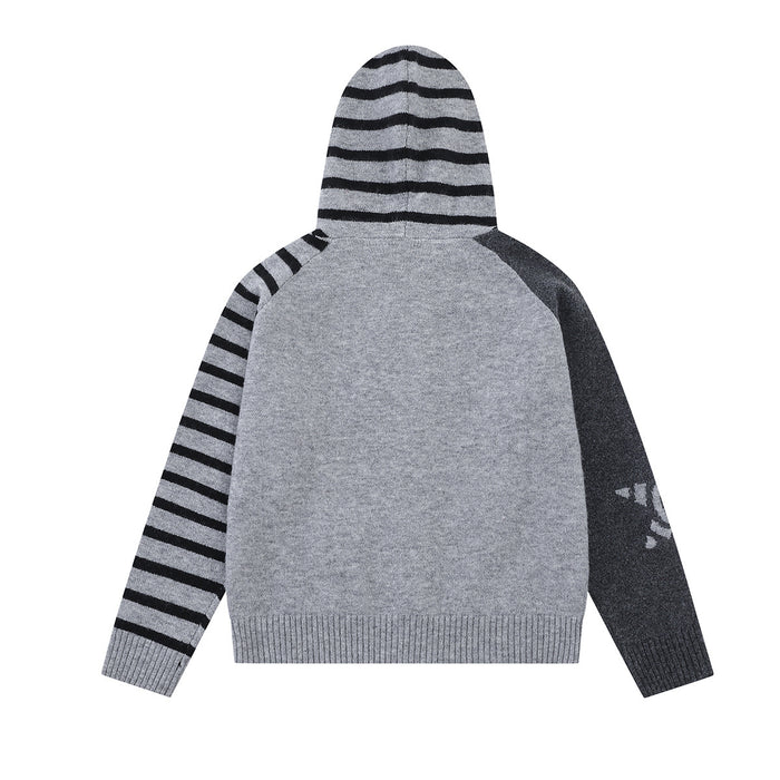 Back view of the gray knit hoodie with a plain gray body, black-striped hood and sleeve, dark contrasting sleeve, and ribbed hem