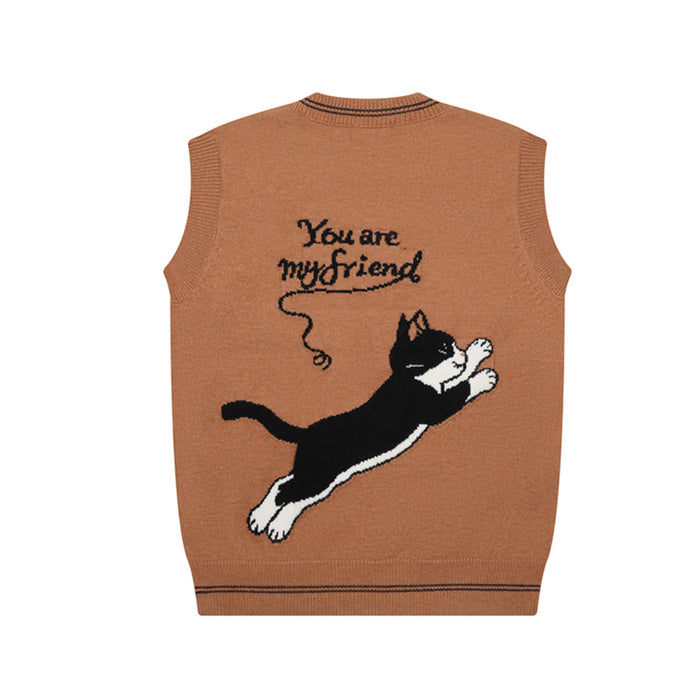 Back view of a brown knit sweater vest featuring a leaping black-and-white cat and friendship text