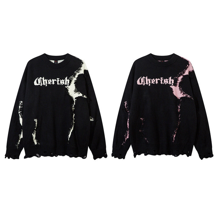 Two black distressed knit sweaters shown front-facing, with white or pink abstract patches and scalloped frayed hems