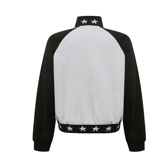 Back view of a gray and black raglan track jacket with a star-patterned collar and hem band