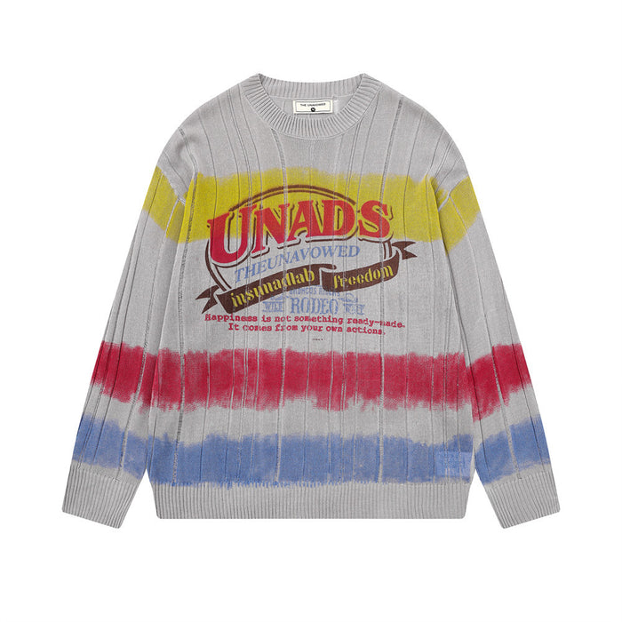 Men's crew neck ribbed knit sweater with tie-dye yellow, red, and blue horizontal stripes and UNADS graphic chest print in gr