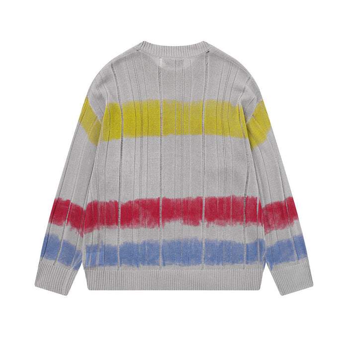 Back view of a gray ribbed knit sweater with yellow, red, and blue horizontal tie-dye stripes