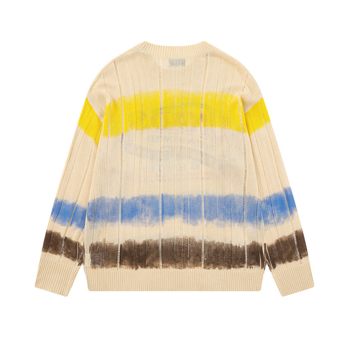 Back view of a cream ribbed knit sweater with yellow, blue, and brown horizontal stripes