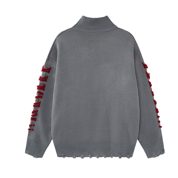 Back view of a gray knit turtleneck sweater with distressed red sleeve accents and a frayed lower hem