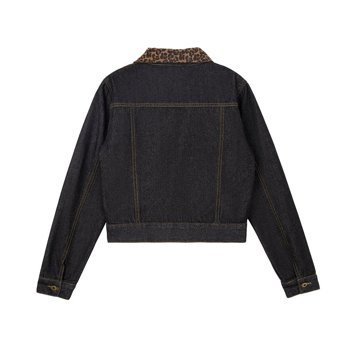Back view of a dark denim jacket with gold stitching, long sleeves, and a leopard print collar