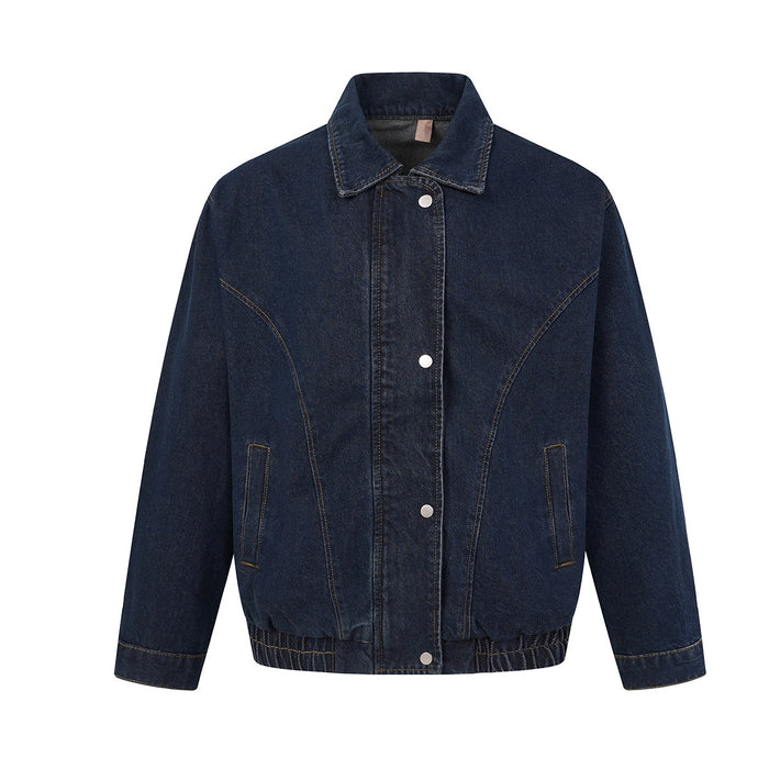 Dark indigo oversized boxy denim bomber jacket with snap buttons, Western yoke seams, and elastic hem, front and back view