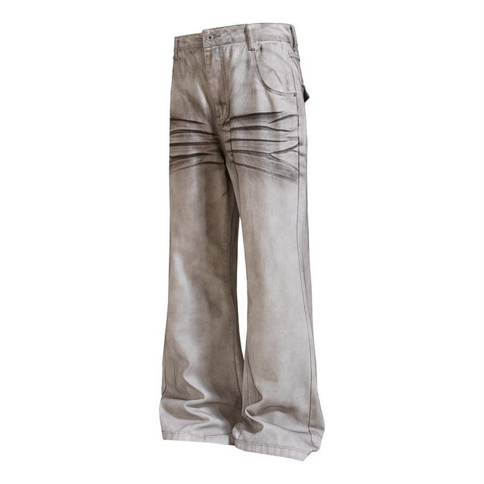 Light gray washed flare jeans shown from a front three-quarter angle with wide legs and crease details