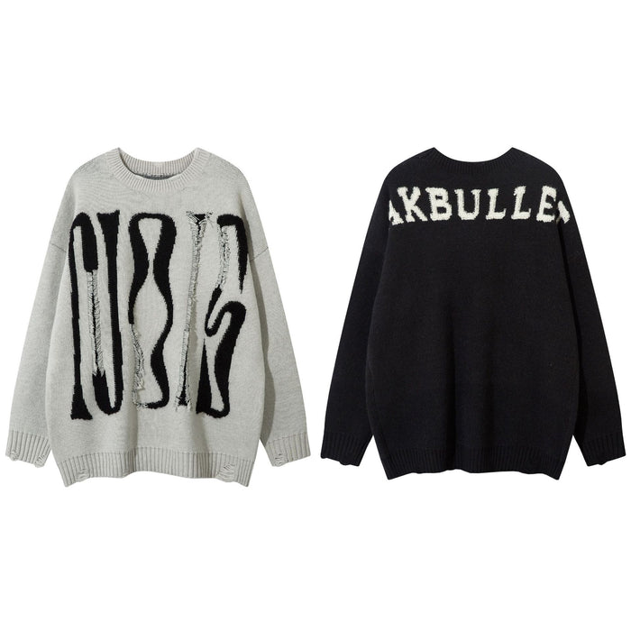 Gray and black oversized knit sweaters shown together, with contrasting front graphics and back lettering