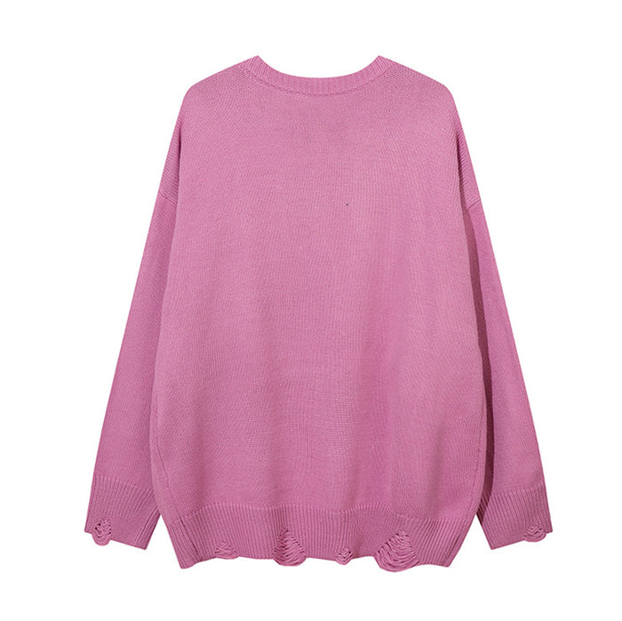 Pink knit crewneck sweater shown from the plain back with distressed hem edges