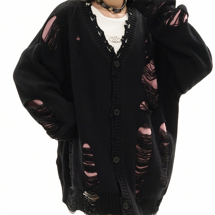 Oversized black distressed ripped knit cardigan with V-neck button front and pink inner lining, front and back views
