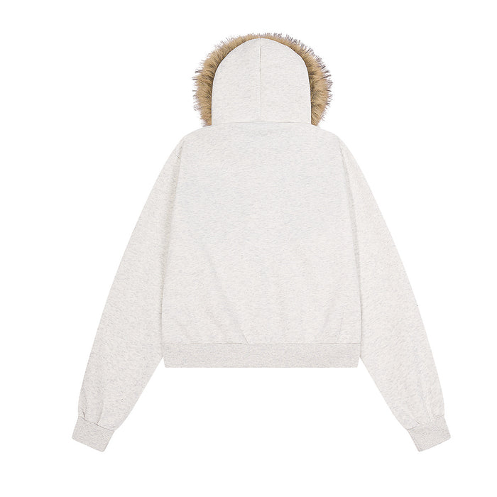 Back view of a light gray cropped hoodie with a plain body, long sleeves, and brown faux fur hood trim