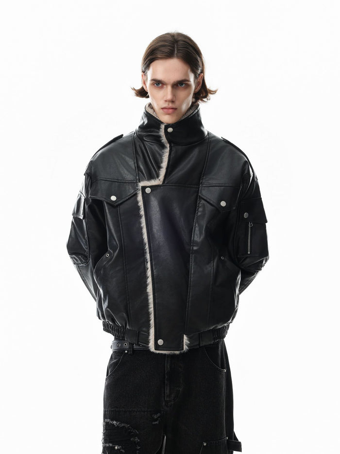 Model wearing a zipped black faux leather bomber jacket with a raised collar, flap pockets, and ribbed hem