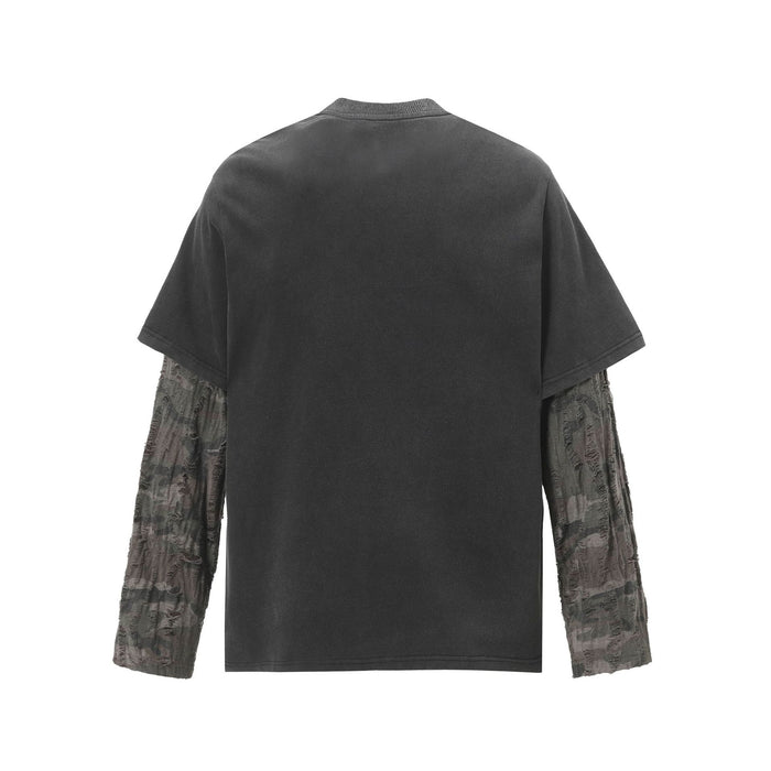 Back view showing the plain washed black body and distressed gray patterned sleeves
