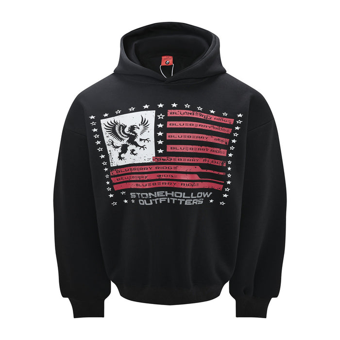 Black pullover hoodie front with an eagle, red striped flag graphic, white stars, and oversized fit