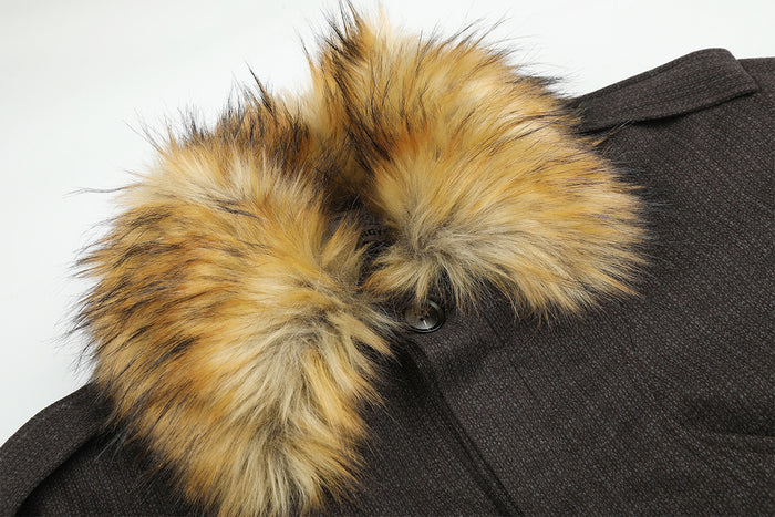 Close-up of the fluffy tan fur collar attached to the dark brown textured jacket