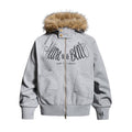 Front view of a gray zip-up hoodie jacket with tan fur-trimmed hood, black script graphic, and front pockets