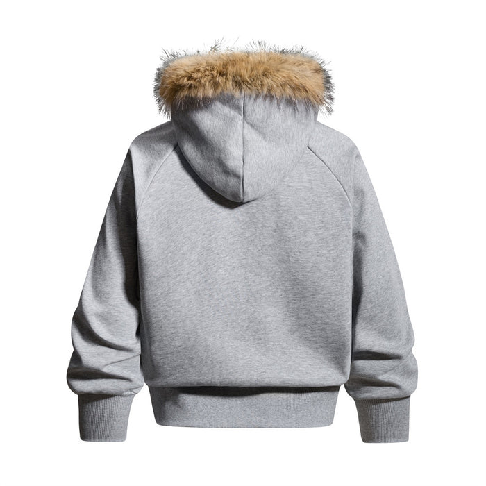 Back view of the gray hoodie jacket with a tan fur-trimmed hood, raglan sleeves, and ribbed hem