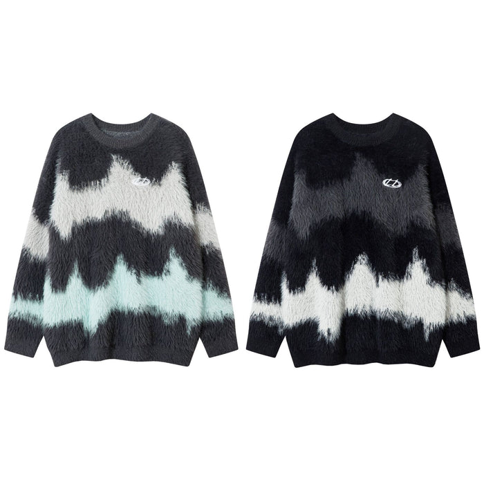 Oversized fuzzy knit sweater with abstract wave colorblock pattern in grey and black, front and back view