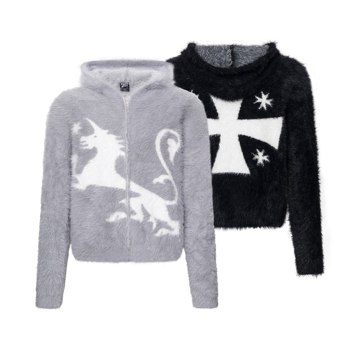 Gray fuzzy zip-up hoodie with a white unicorn graphic beside a black star-and-cross sweater