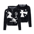 Two black fuzzy tops shown together, including a unicorn zip-up hoodie and star-cross sweater