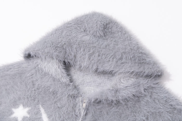 Close-up of the soft gray fuzzy hood and folded neckline on the zip-up hoodie