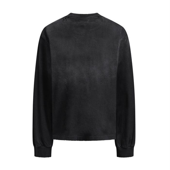 Back view of a black long sleeve tee showing a plain distressed finish and ribbed cuffs