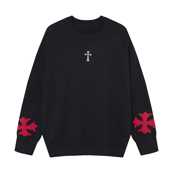 Oversized men's gothic cross jacquard crewneck knit sweater in black showing front cross badge and red sleeve panels