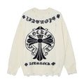 Cream knit sweater with black Gothic lettering, large cross graphic, and distressed frayed cuffs and hem