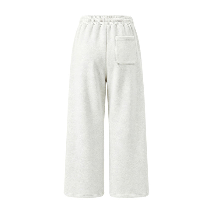 Back view of white wide-leg sweatpants showing a single rectangular rear pocket