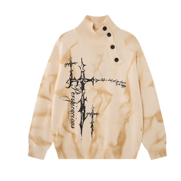 Front view of the cream marbled knit turtleneck sweater with black thorny cross graphic and diagonal buttons