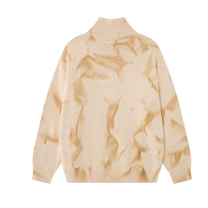 Back view of the cream marbled knit turtleneck sweater showing its plain tonal pattern and ribbed hem